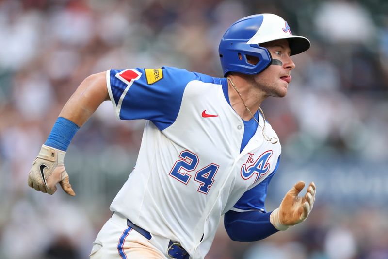 Jun 15, 2024; Cumberland, Georgia, USA; Atlanta Braves left fielder Jarred Kelenic (24) runs to second base against the Tampa Bay Rays during the eighth inning at Truist Park. Mandatory Credit: Mady Mertens-USA TODAY Sports