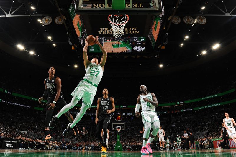 BOSTON, MA - FEBRUARY 14: Jordan Walsh #27 of the Boston Celtics drives to the basket during the game against the Brooklyn Nets on February 14, 2024 at the TD Garden in Boston, Massachusetts. NOTE TO USER: User expressly acknowledges and agrees that, by downloading and or using this photograph, User is consenting to the terms and conditions of the Getty Images License Agreement. Mandatory Copyright Notice: Copyright 2024 NBAE  (Photo by Brian Babineau/NBAE via Getty Images)