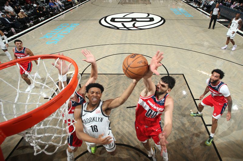 BROOKLYN, NY - OCTOBER 14: Jaylen Martin #16 of the Brooklyn Nets drives to the basket during the game against the Washington Wizards during a NBA preseason game on October 14, 2024 at Barclays Center in Brooklyn, New York. NOTE TO USER: User expressly acknowledges and agrees that, by downloading and or using this Photograph, user is consenting to the terms and conditions of the Getty Images License Agreement. Mandatory Copyright Notice: Copyright 2024 NBAE (Photo by Nathaniel S. Butler/NBAE via Getty Images)