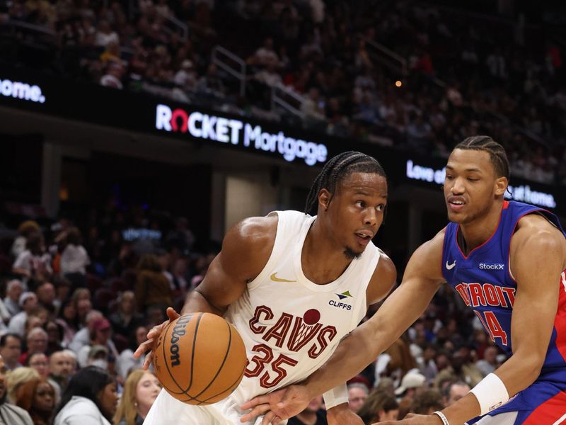 CLEVELAND, OH - OCTOBER 25: Isaac Okoro #35 of the Cleveland Cavaliers dribbles the ball during the game against the Detroit Pistons  on October 25, 2024 at Rocket Mortgage FieldHouse in Cleveland, Ohio. NOTE TO USER: User expressly acknowledges and agrees that, by downloading and/or using this Photograph, user is consenting to the terms and conditions of the Getty Images License Agreement. Mandatory Copyright Notice: Copyright 2024 NBAE (Photo by  Lauren Leigh Bacho/NBAE via Getty Images)