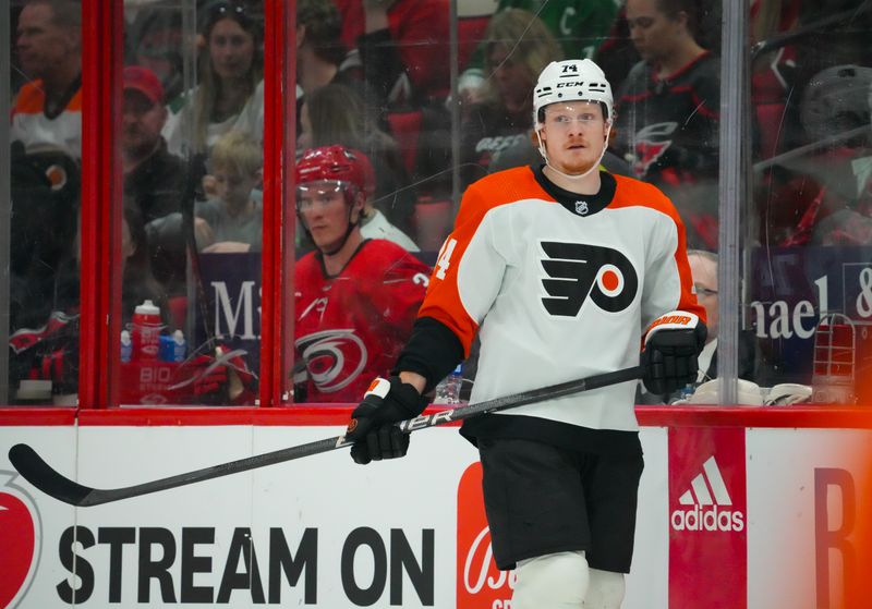 Mar 21, 2024; Raleigh, North Carolina, USA; Philadelphia Flyers right wing Owen Tippett (74) skates against the Carolina Hurricanes during the first period at PNC Arena. Mandatory Credit: James Guillory-USA TODAY Sports