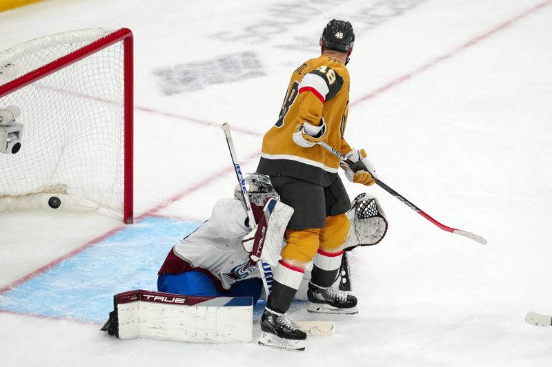 Apr 14, 2024; Las Vegas, Nevada, USA; Vegas Golden Knights center Tomas Hertl (48) deflects a shot past Colorado Avalanche goaltender Alexandar Georgiev (40) during an overtime period to give the Golden Knights a 4-3 victory at T-Mobile Arena. Mandatory Credit: Stephen R. Sylvanie-USA TODAY Sports