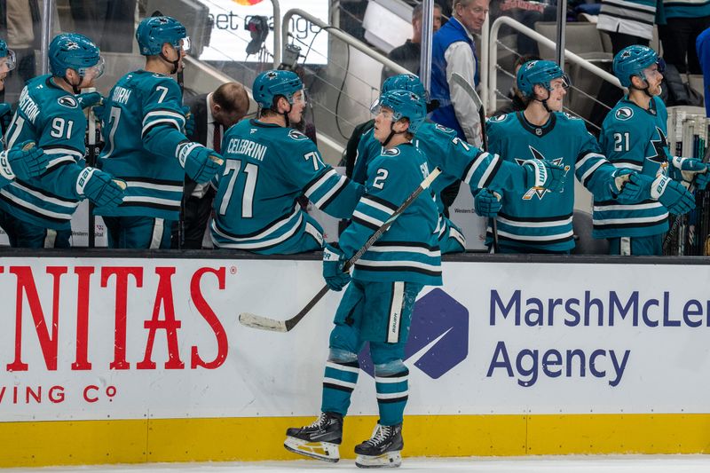 Nov 27, 2024; San Jose, California, USA; San Jose Sharks center Will Smith (2) celebrates with teammates after the goal against the Ottawa Senators during the third period at SAP Center at San Jose. Mandatory Credit: Neville E. Guard-Imagn Images