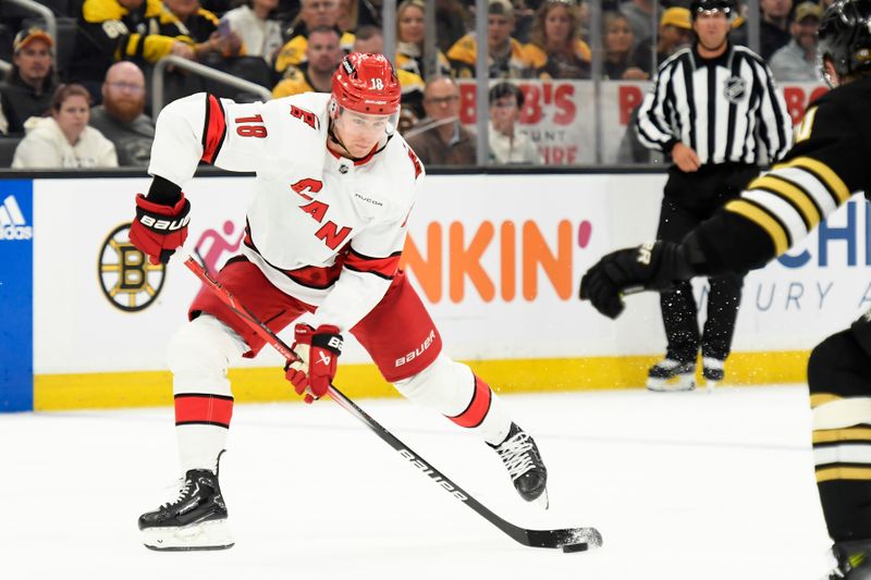 Apr 9, 2024; Boston, Massachusetts, USA; Carolina Hurricanes center Jack Drury (18) gets set to shoot the puck during the second period against the Boston Bruins at TD Garden. Mandatory Credit: Bob DeChiara-USA TODAY Sports