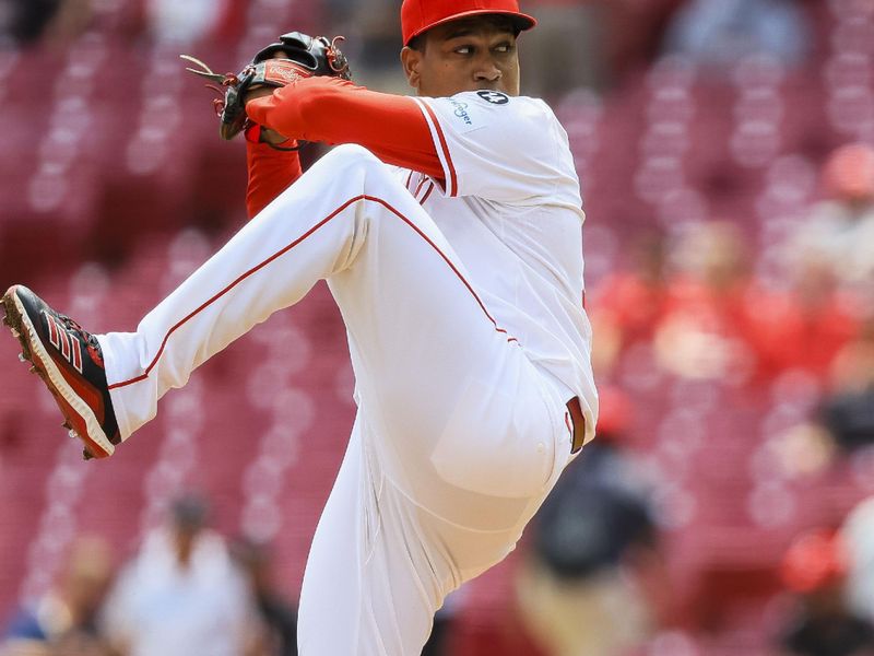 Apr 30, 2025; Cincinnati, Ohio, USA; Cincinnati Reds relief pitcher Alexis Diaz (43) pitches against the St. Louis Cardinals in the ninth inning at Great American Ball Park. Mandatory Credit: Katie Stratman-Imagn Images
