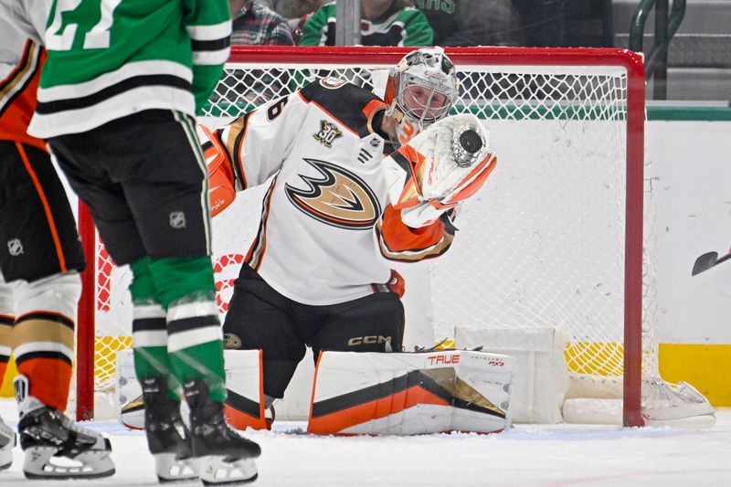 Jan 25, 2024; Dallas, Texas, USA; Anaheim Ducks goaltender John Gibson (36) gloves the puck in the air during the third period against the Dallas Stars at the American Airlines Center. Mandatory Credit: Jerome Miron-USA TODAY Sports