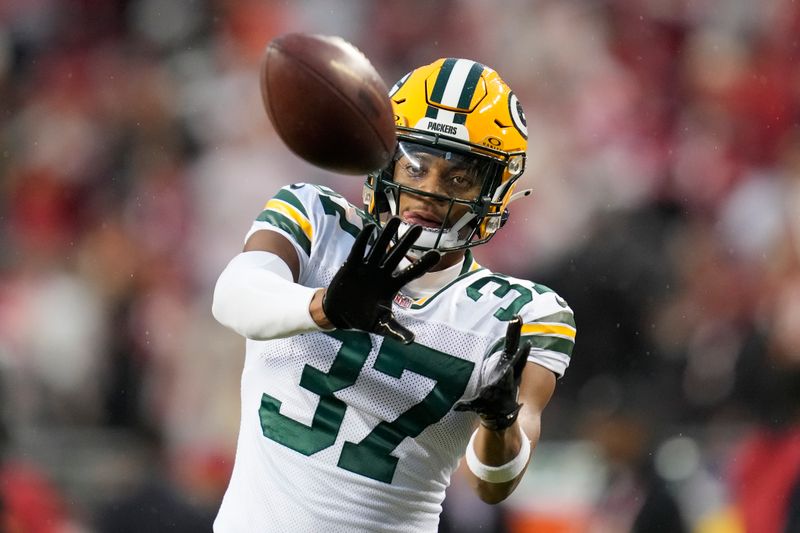 Green Bay Packers cornerback Carrington Valentine (37) warms up before an NFL football game against the San Francisco 49ers Sunday, Jan. 21, 2024, in Inglewood, Calif. (AP Photo/Ashley Landis)