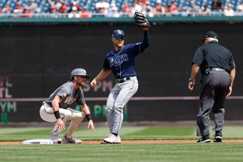 Apr 5, 2023; Washington, District of Columbia, USA; Washington Nationals right fielder Lane Thomas (28) steals second base ahead of a tag by Tampa Bay Rays second baseman Taylor Walls (6) during the first inning at Nationals Park. Mandatory Credit: Geoff Burke-USA TODAY Sports