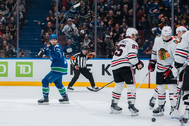 Mar 15, 2025; Vancouver, British Columbia, CAN; Vancouver Canucks forward Pius Suter (24) celebrates his goal against the Chicago Blackhawks in the third period at Rogers Arena. Mandatory Credit: Bob Frid-Imagn Images