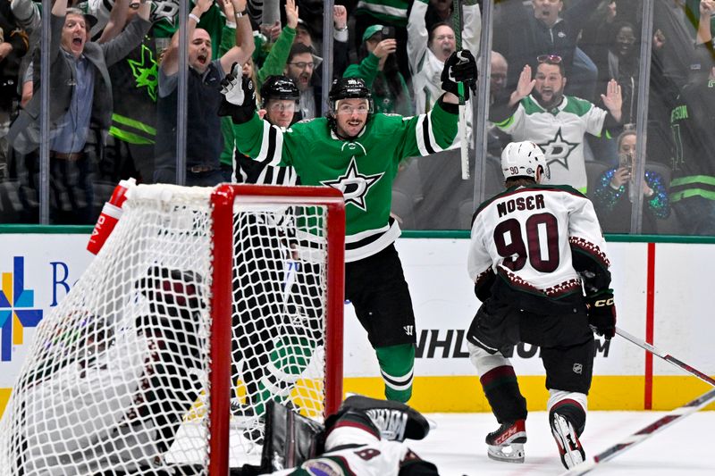 Nov 14, 2023; Dallas, Texas, USA; Dallas Stars center Matt Duchene (95) celebrates after he scores the game winning goal against Arizona Coyotes goaltender Karel Vejmelka (70) during the overtime period at the American Airlines Center. Mandatory Credit: Jerome Miron-USA TODAY Sports