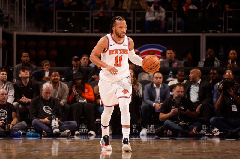 DETROIT, MI - NOVEMBER 1: Jalen Brunson #11 of the New York Knicks dribbles the ball during the game against the Detroit Pistons on November 1, 2024 at Little Caesars Arena in Detroit, Michigan. NOTE TO USER: User expressly acknowledges and agrees that, by downloading and/or using this photograph, User is consenting to the terms and conditions of the Getty Images License Agreement. Mandatory Copyright Notice: Copyright 2024 NBAE (Photo by Brian Sevald/NBAE via Getty Images)