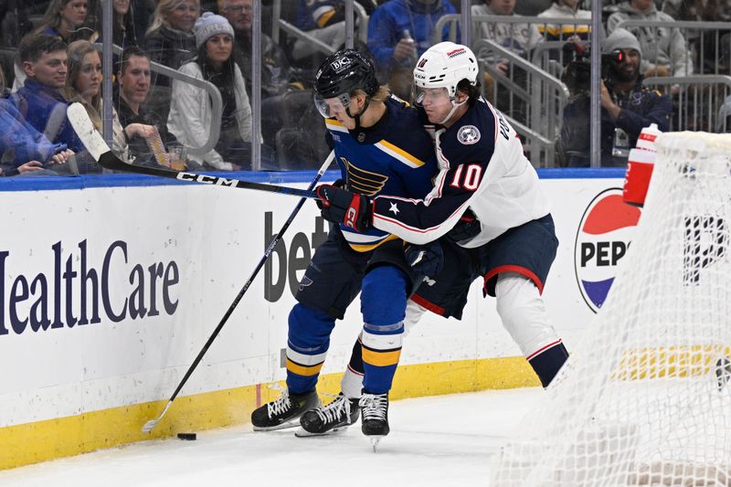 Jan 30, 2024; St. Louis, Missouri, USA; Columbus Blue Jackets left wing Dmitri Voronkov (10) pressures St. Louis Blues center Nikita Alexandrov (59) during the second period at Enterprise Center. Mandatory Credit: Jeff Le-USA TODAY Sports