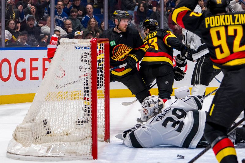 Mar 25, 2024; Vancouver, British Columbia, CAN; Vancouver Canucks forward Sam Lafferty (18) celebrates his goal scored on Los Angeles Kings goalie Cam Talbot (39) in the first period at Rogers Arena. Mandatory Credit: Bob Frid-USA TODAY Sports