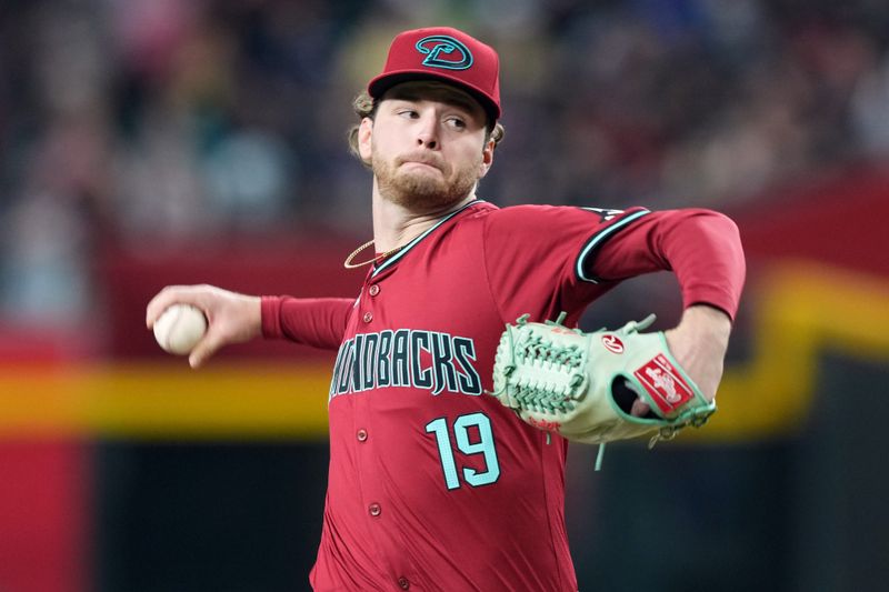 May 5, 2024; Phoenix, Arizona, USA; Arizona Diamondbacks starting pitcher Ryne Nelson (19) pitches against the San Diego Padres during the fourth inning at Chase Field. Mandatory Credit: Joe Camporeale-USA TODAY Sports