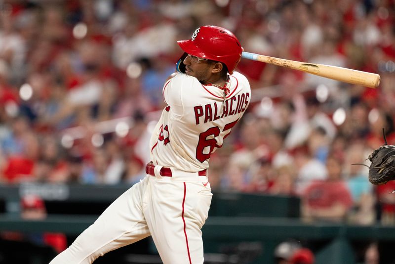 Sep 30, 2023; St. Louis, Missouri, USA; St. Louis Cardinals outfielder Richie Palacios (67) hits a base hit against the Cincinnati Reds in the sixth inning at Busch Stadium. Mandatory Credit: Zach Dalin-USA TODAY Sports