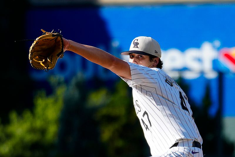 Jul 4, 2024; Denver, Colorado, USA; Colorado Rockies starting pitcher Cal Quantrill (47) delivers a pitch against the Milwaukee Brewers during the first inning at Coors Field. Mandatory Credit: Troy Babbitt-USA TODAY Sports

 