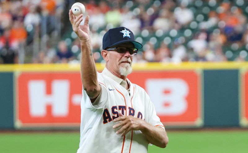 Jun 16, 2024; Houston, Texas, USA;  Tom Hader father of  Houston Astros relief pitcher Josh Hader (71) throws one of the first pitches on Fathers day before The Astros played against the Detroit Tigers at Minute Maid Park. Mandatory Credit: Thomas Shea-USA TODAY Sports