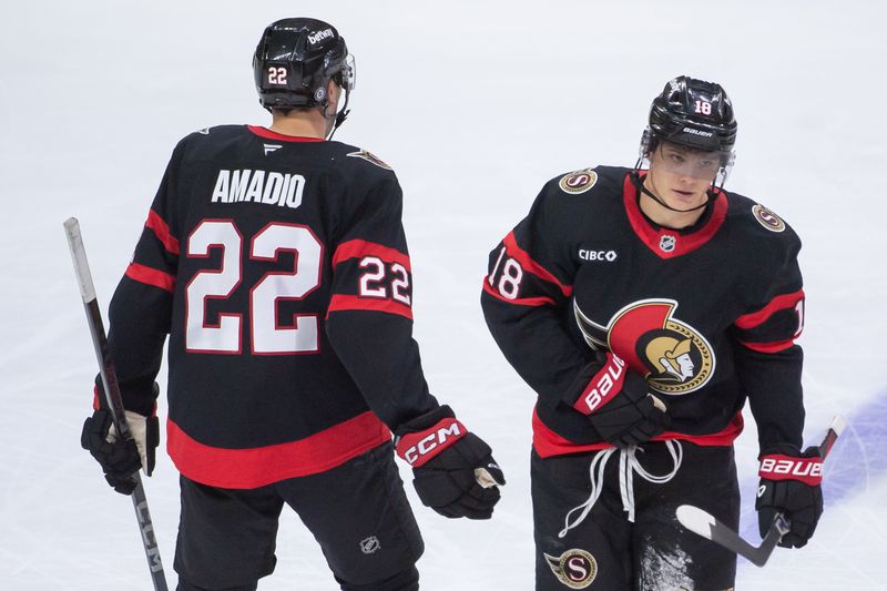 Nov 2, 2024; Ottawa, Ontario, CAN; Ottawa Senators center Tim Stutzle (18) scores an empty net goal in the third period against the Seattle Kraken at the Canadian Tire Centre. Mandatory Credit: Marc DesRosiers-Imagn Images
