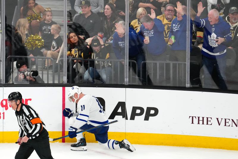 Feb 22, 2024; Las Vegas, Nevada, USA; Toronto Maple Leafs center Max Domi (11) celebrates after scoring a goal against the Vegas Golden Knights during the second period at T-Mobile Arena. Mandatory Credit: Stephen R. Sylvanie-USA TODAY Sports