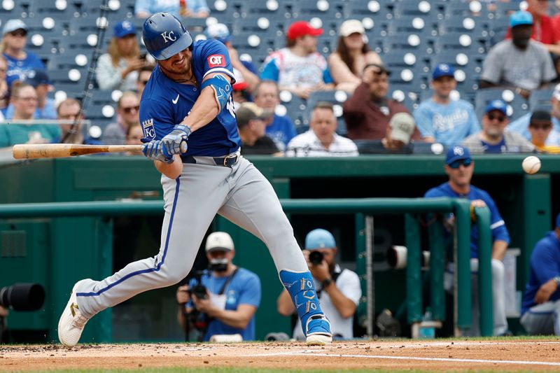 Sep 26, 2024; Washington, District of Columbia, USA; Kansas City Royals outfielder Hunter Renfroe (16) hits a solo home run against the Washington Nationals during the second inning at Nationals Park. Mandatory Credit: Geoff Burke-Imagn Images