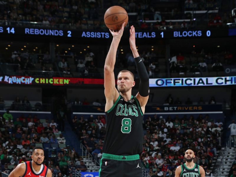 NEW ORLEANS, LA - MARCH 30: Kristaps Porzingis #8 of the Boston Celtics shoots a free throw during the game against the New Orleans Pelicans on March 30, 2024 at the Smoothie King Center in New Orleans, Louisiana. NOTE TO USER: User expressly acknowledges and agrees that, by downloading and or using this Photograph, user is consenting to the terms and conditions of the Getty Images License Agreement. Mandatory Copyright Notice: Copyright 2024 NBAE (Photo by Layne Murdoch Jr./NBAE via Getty Images)