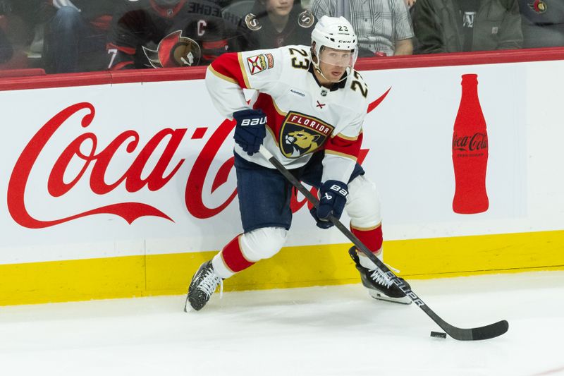 Apr 5, 2025; Ottawa, Ontario, CAN; Florida Panthers center Carter Verhaeghe (23) skates with the puck in the third period against the  Ottawa Senators at the Canadian Tire Centre. Mandatory Credit: Marc DesRosiers-Imagn Images