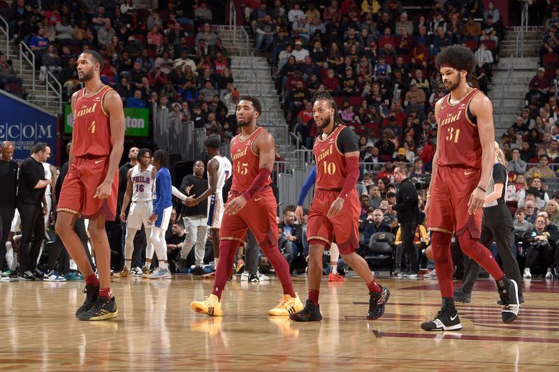 CLEVELAND, OH - FEBRUARY 12: The Cleveland Cavaliers enter a timeout during the game against the Philadelphia 76ers on February 12, 2024 at Rocket Mortgage FieldHouse in Cleveland, Ohio. NOTE TO USER: User expressly acknowledges and agrees that, by downloading and/or using this Photograph, user is consenting to the terms and conditions of the Getty Images License Agreement. Mandatory Copyright Notice: Copyright 2024 NBAE (Photo by David Liam Kyle/NBAE via Getty Images)