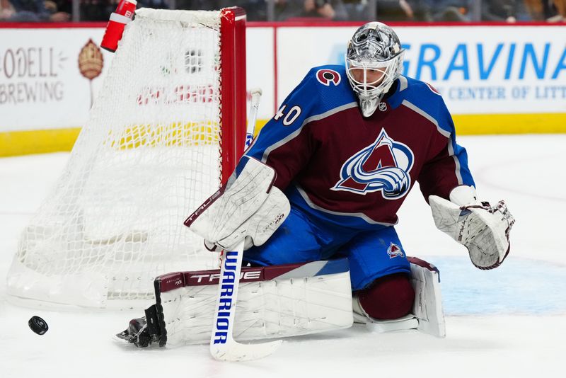 Nov 27, 2023; Denver, Colorado, USA; Colorado Avalanche goaltender Alexandar Georgiev (40) makes a save in the third period against the Tampa Bay Lightning at Ball Arena. Mandatory Credit: Ron Chenoy-USA TODAY Sports