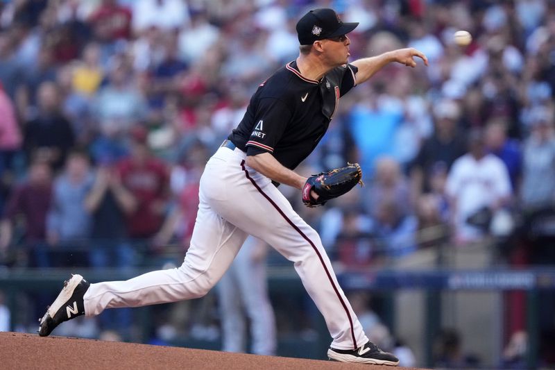 Oct 31, 2023; Phoenix, Arizona, USA; Arizona Diamondbacks starting pitcher Joe Mantiply (35) throws a pitch against the Texas Rangers before game four of the 2023 World Series at Chase Field. Mandatory Credit: Joe Camporeale-USA TODAY Sports