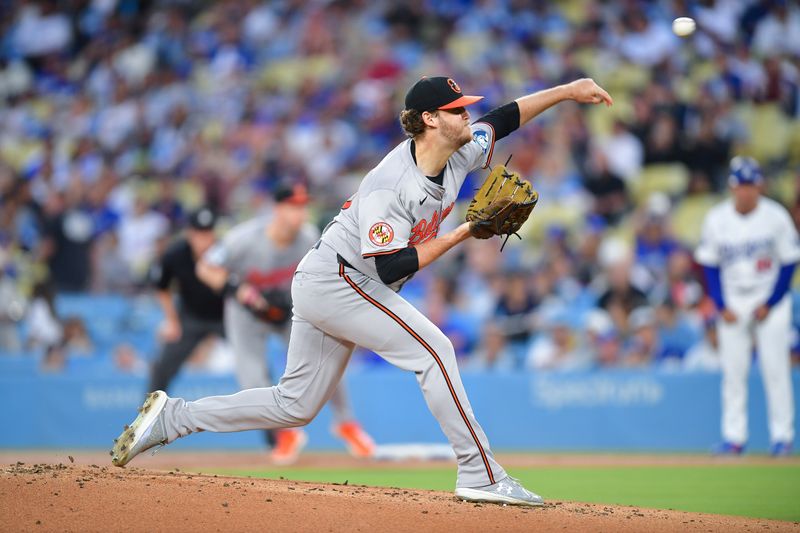 Aug 27, 2024; Los Angeles, California, USA; Baltimore Orioles pitcher Cole Irvin (19) throws against the Los Angeles Dodgers during the first inning at Dodger Stadium. Mandatory Credit: Gary A. Vasquez-USA TODAY Sports