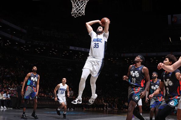 BROOKLYN, NY - NOVEMBER 14: Goga Bitadze #35 of the Orlando Magic dunks the ball during the game against the Brooklyn Nets during the In-Season Tournament game on November 14, 2023 at Barclays Center in Brooklyn, New York. NOTE TO USER: User expressly acknowledges and agrees that, by downloading and or using this Photograph, user is consenting to the terms and conditions of the Getty Images License Agreement. Mandatory Copyright Notice: Copyright 2023 NBAE (Photo by Nathaniel S. Butler/NBAE via Getty Images)