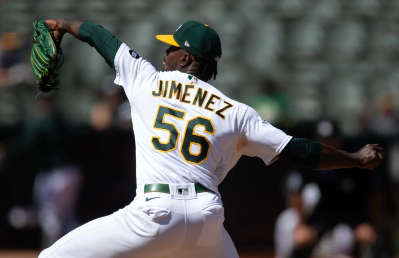 Sep 6, 2023; Oakland, California, USA; Oakland Athletics pitcher Dany Jim  nez (56) delivers a pitch against the Toronto Blue Jays during the eighth inning at Oakland-Alameda County Coliseum. Mandatory Credit: D. Ross Cameron-USA TODAY Sports