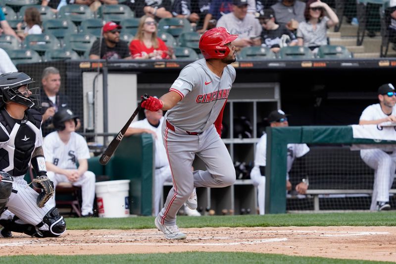 Apr 14, 2024; Chicago, Illinois, USA; Cincinnati Reds third base Jeimer Candelario (3) hits single against the Chicago White Sox during the second inning at Guaranteed Rate Field. Mandatory Credit: David Banks-USA TODAY Sports