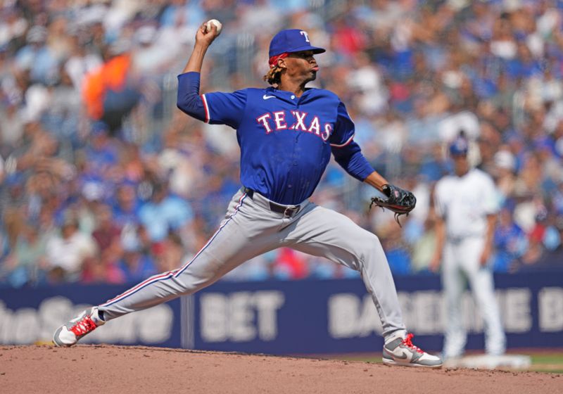 Jul 27, 2024; Toronto, Ontario, CAN; Texas Rangers relief pitcher José Ureña (54) throws pitch gainst the Toronto Blue Jays during the first inning at Rogers Centre. Mandatory Credit: Nick Turchiaro-USA TODAY Sports