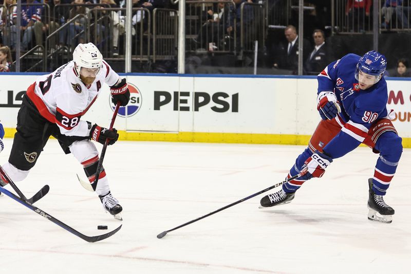 Nov 1, 2024; New York, New York, USA;  Ottawa Senators right wing Claude Giroux (28) and New York Rangers defenseman Victor Mancini (90) battle for control of the puck in the third period at Madison Square Garden. Mandatory Credit: Wendell Cruz-Imagn Images