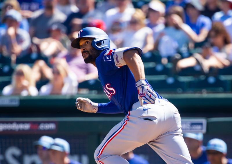 Mar 20, 2024; Goodyear, Arizona, USA; Texas Rangers second baseman Marcus Semien rounds the bases after hitting a grand slam against the Cincinnati Reds during a spring training baseball game at Goodyear Ballpark. Mandatory Credit: Mark J. Rebilas-USA TODAY Sports