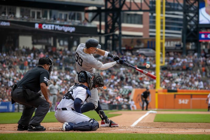 Aug 17, 2024; Detroit, Michigan, USA; New York Yankees outfielder Aaron Judge (99) swings and makes contact in the first inning against the Detroit Tigers at Comerica Park. Mandatory Credit: David Reginek-USA TODAY Sports