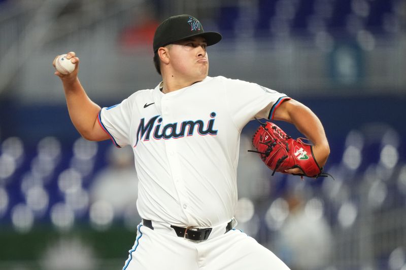 Aug 7, 2024; Miami, Florida, USA;  Miami Marlins starting pitcher Valente Bellozo (83) pitches against the Cincinnati Reds in the first inning at loanDepot Park. Mandatory Credit: Jim Rassol-USA TODAY Sports