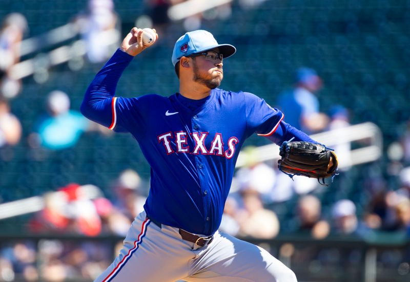 Mar 20, 2024; Goodyear, Arizona, USA; Texas Rangers pitcher Dane Dunning against the Cincinnati Reds during a spring training baseball game at Goodyear Ballpark. Mandatory Credit: Mark J. Rebilas-USA TODAY Sports