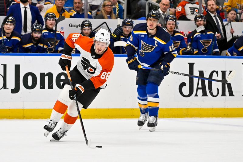 Jan 15, 2024; St. Louis, Missouri, USA;  Philadelphia Flyers left wing Joel Farabee (86) controls the puck against the St. Louis Blues during the third period at Enterprise Center. Mandatory Credit: Jeff Curry-USA TODAY Sports