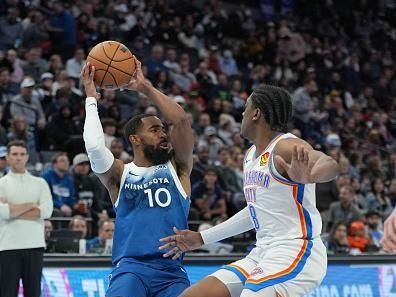 MINNEAPOLIS, MN -  NOVEMBER 28: Mike Conley #10 of the Minnesota Timberwolves handles the ball during the game against the Oklahoma City Thunder during the In-Season Tournament on November 28, 2023 at Target Center in Minneapolis, Minnesota. NOTE TO USER: User expressly acknowledges and agrees that, by downloading and or using this Photograph, user is consenting to the terms and conditions of the Getty Images License Agreement. Mandatory Copyright Notice: Copyright 2023 NBAE (Photo by Jordan Johnson/NBAE via Getty Images)