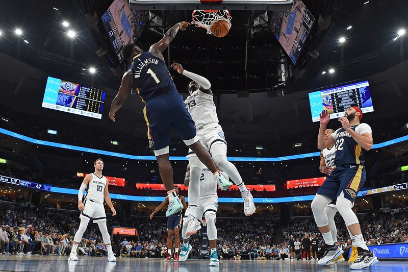 MEMPHIS, TENNESSEE - OCTOBER 25: Zion Williamson #1 of the New Orleans Pelicans goes to the basket against Jaren Jackson Jr. #13 of the Memphis Grizzlies during the game at FedExForum on October 25, 2023 in Memphis, Tennessee. NOTE TO USER: User expressly acknowledges and agrees that, by downloading and or using this photograph, User is consenting to the terms and conditions of the Getty Images License Agreement. (Photo by Justin Ford/Getty Images)