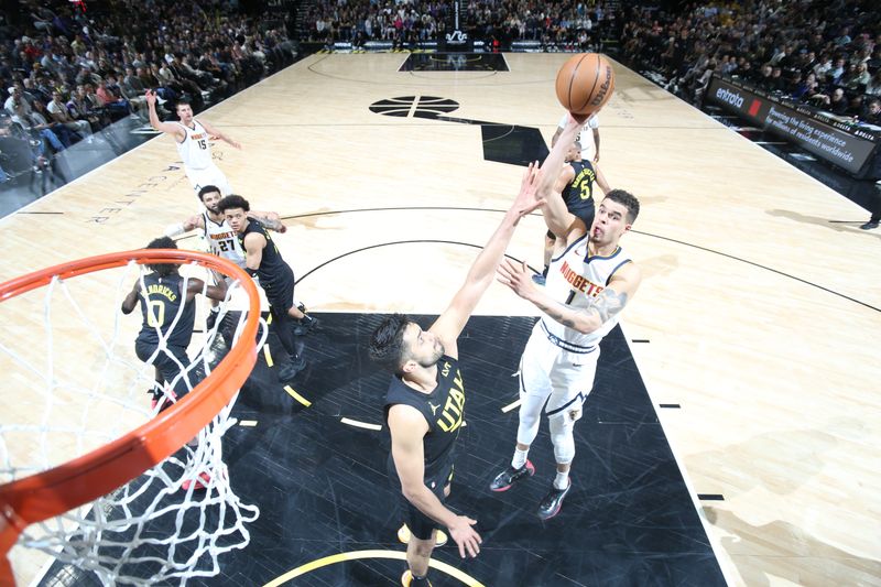 SALT LAKE CITY, UT - APRIL 9: Michael Porter Jr. #1 of the Denver Nuggets shoots the ball during the game against the Utah Jazz on April 9, 2024 at Delta Center in Salt Lake City, Utah. NOTE TO USER: User expressly acknowledges and agrees that, by downloading and or using this Photograph, User is consenting to the terms and conditions of the Getty Images License Agreement. Mandatory Copyright Notice: Copyright 2024 NBAE (Photo by Melissa Majchrzak/NBAE via Getty Images)