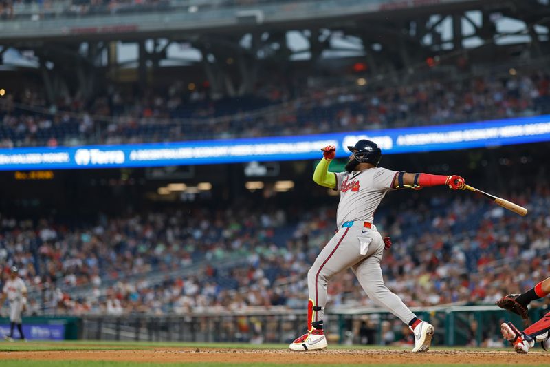 Jun 6, 2024; Washington, District of Columbia, USA; Atlanta Braves designated hitter Marcell Ozuna (20) hits a two run home run against the Washington Nationals during the eighth inning at Nationals Park. Mandatory Credit: Geoff Burke-USA TODAY Sports