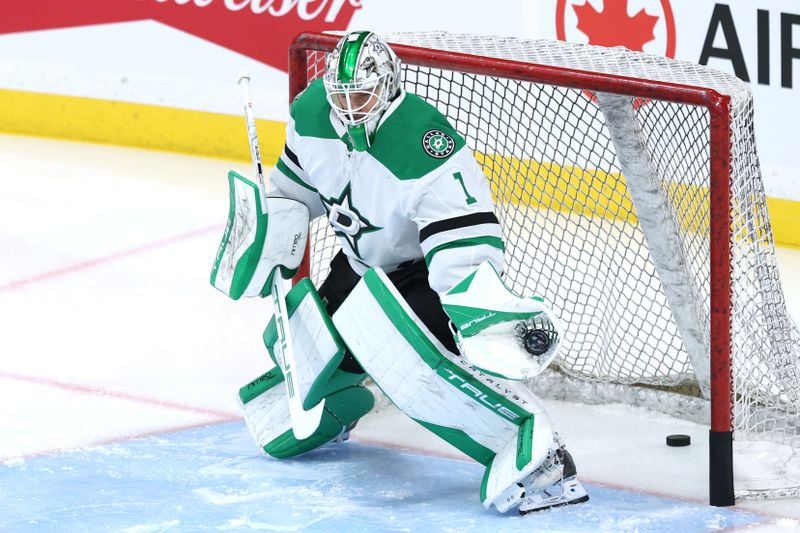 Dec 9, 2025; Winnipeg, Manitoba, CAN; Dallas Stars goaltender Casey Desmith (1) warms up before a game against the Winnipeg Jets at Canada Life Centre. Mandatory Credit: James Carey Lauder-Imagn Images