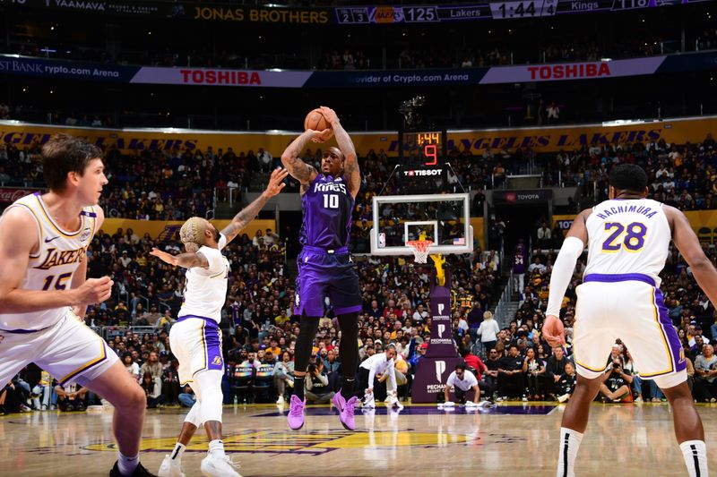 LOS ANGELES, CA - OCTOBER 26: DeMar DeRozan #10 of the Sacramento Kings shoots a three point basket during the game against the Los Angeles Lakers on October 26, 2024 at Crypto.Com Arena in Los Angeles, California. NOTE TO USER: User expressly acknowledges and agrees that, by downloading and/or using this Photograph, user is consenting to the terms and conditions of the Getty Images License Agreement. Mandatory Copyright Notice: Copyright 2024 NBAE (Photo by Adam Pantozzi/NBAE via Getty Images)