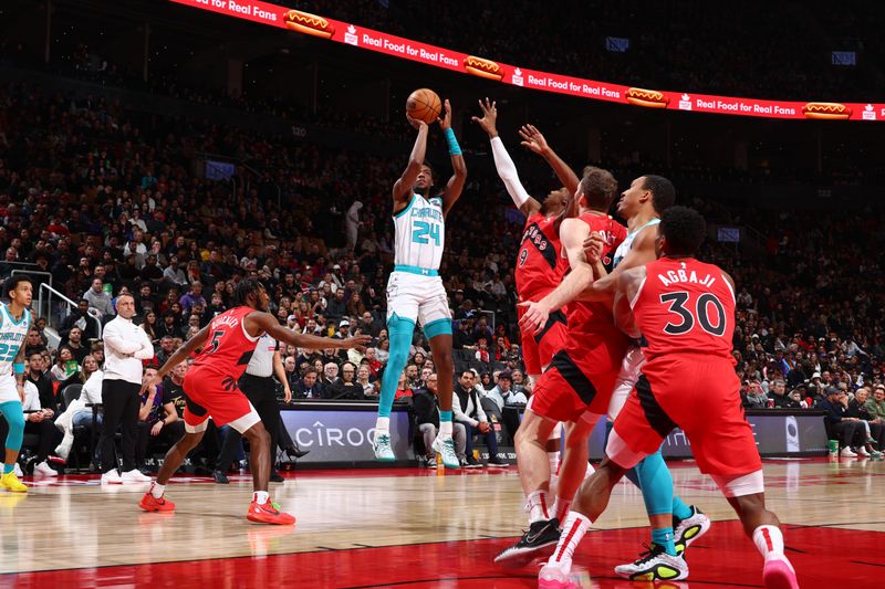 TORONTO, CANADA - MARCH 3: Brandon Miller #24 of the Charlotte Hornets shoots the ball during the game against the Toronto Raptors on March 3, 2024 at the Scotiabank Arena in Toronto, Ontario, Canada.  NOTE TO USER: User expressly acknowledges and agrees that, by downloading and or using this Photograph, user is consenting to the terms and conditions of the Getty Images License Agreement.  Mandatory Copyright Notice: Copyright 2024 NBAE (Photo by Vaughn Ridley/NBAE via Getty Images)