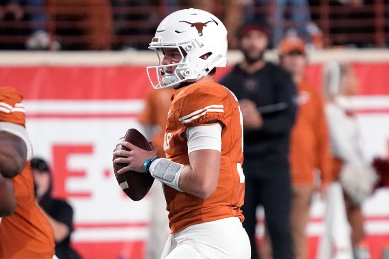 Nov 24, 2023; Austin, Texas, USA; Texas Longhorns quarterback Quinn Ewers (3) looks to throw a pass during the first half against the Texas Tech Red Raiders at Darrell K Royal-Texas Memorial Stadium. Mandatory Credit: Scott Wachter-USA TODAY Sports