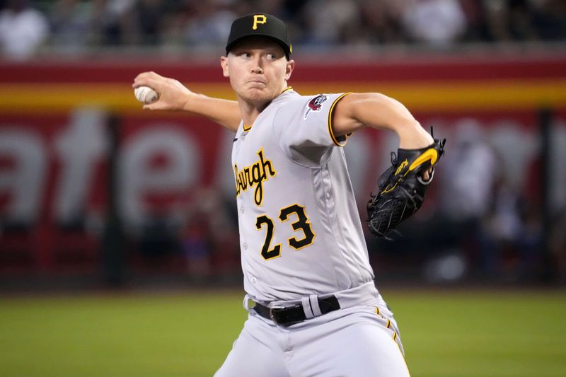 Jul 8, 2023; Phoenix, Arizona, USA; Pittsburgh Pirates starting pitcher Mitch Keller (23) pitches against the Arizona Diamondbacks during the first inning at Chase Field. Mandatory Credit: Joe Camporeale-USA TODAY Sports