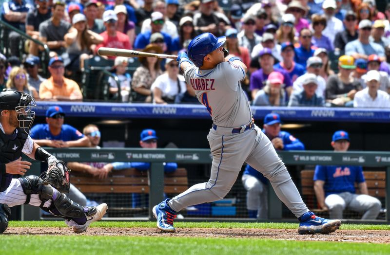 May 28, 2023; Denver, Colorado, USA; New York Mets catcher Francisco Alvarez (4) launches a 420 ft. home run in the fourth inning against the Colorado Rockies at Coors Field. Mandatory Credit: John Leyba-USA TODAY Sports